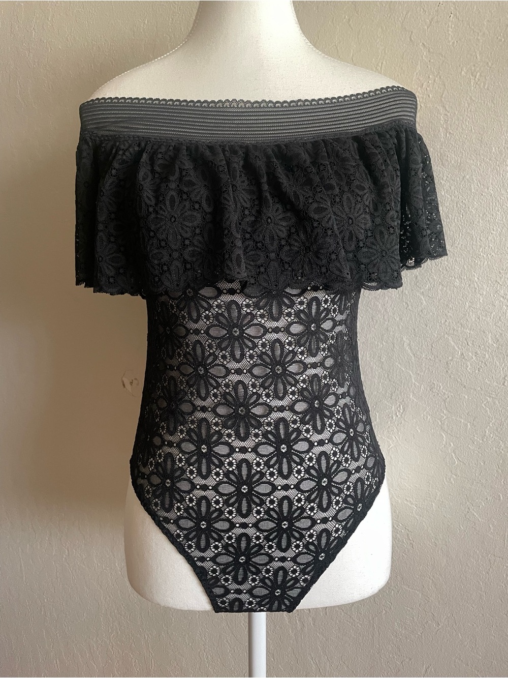 Victoriaโs Secret off the shoulder ruffle bodysuit